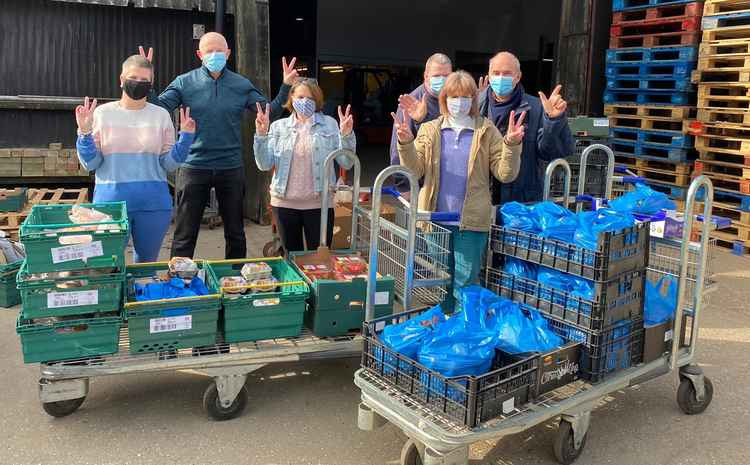 Team at Maldon Fruit Supplies sorting deliveries