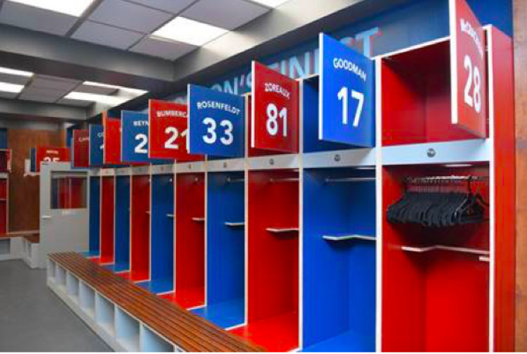 Distinctive club colours of blue and red in the AFC Richmond dressing room at West London Film Studios