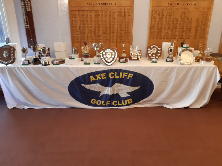 The table is set with a fine array of trophies for the Seniors at Axe Cliff