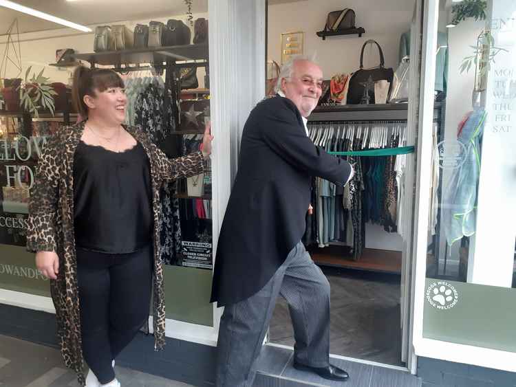 Allison with Town Mayor David Ogg as he cuts the ribbon to let the first customers in