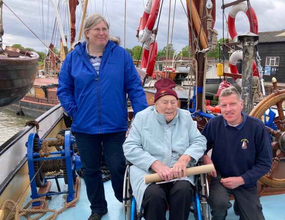 Bryn Weightman, his wife and Trust Chairman Peter Taylor by the wheel on Centaur