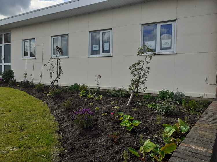 Blooming lovely: the volunteers have worked hard to prepare the soil