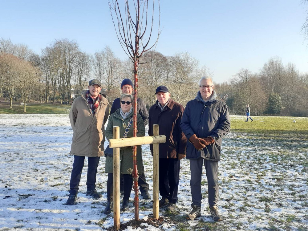 A tree jointly funded by The Friends of Sandbach Park with the Rotary Club of Sandbach Crosses has been planted in the park.  Malcolm Bulger, president of the Rotary Club of Sandbach Crosses is on the far right. 