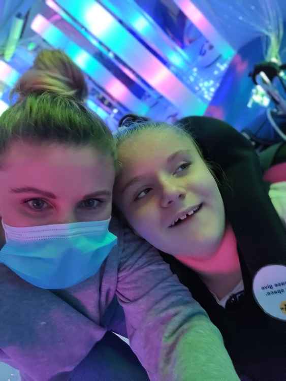 Mum Sarah Boreham and Evie Malins in the Multi-sensory Room at Little Havens.