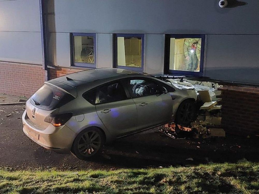 A car crashed into a building at the Gore Cross Business Park (photo credit: Bridport Fire Station)