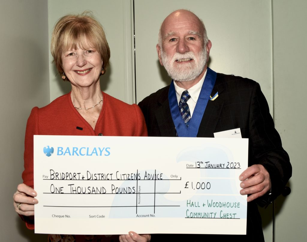 Cllr Bark collected the cheque from Hall & Woodhouse at their Community Chest awards evening