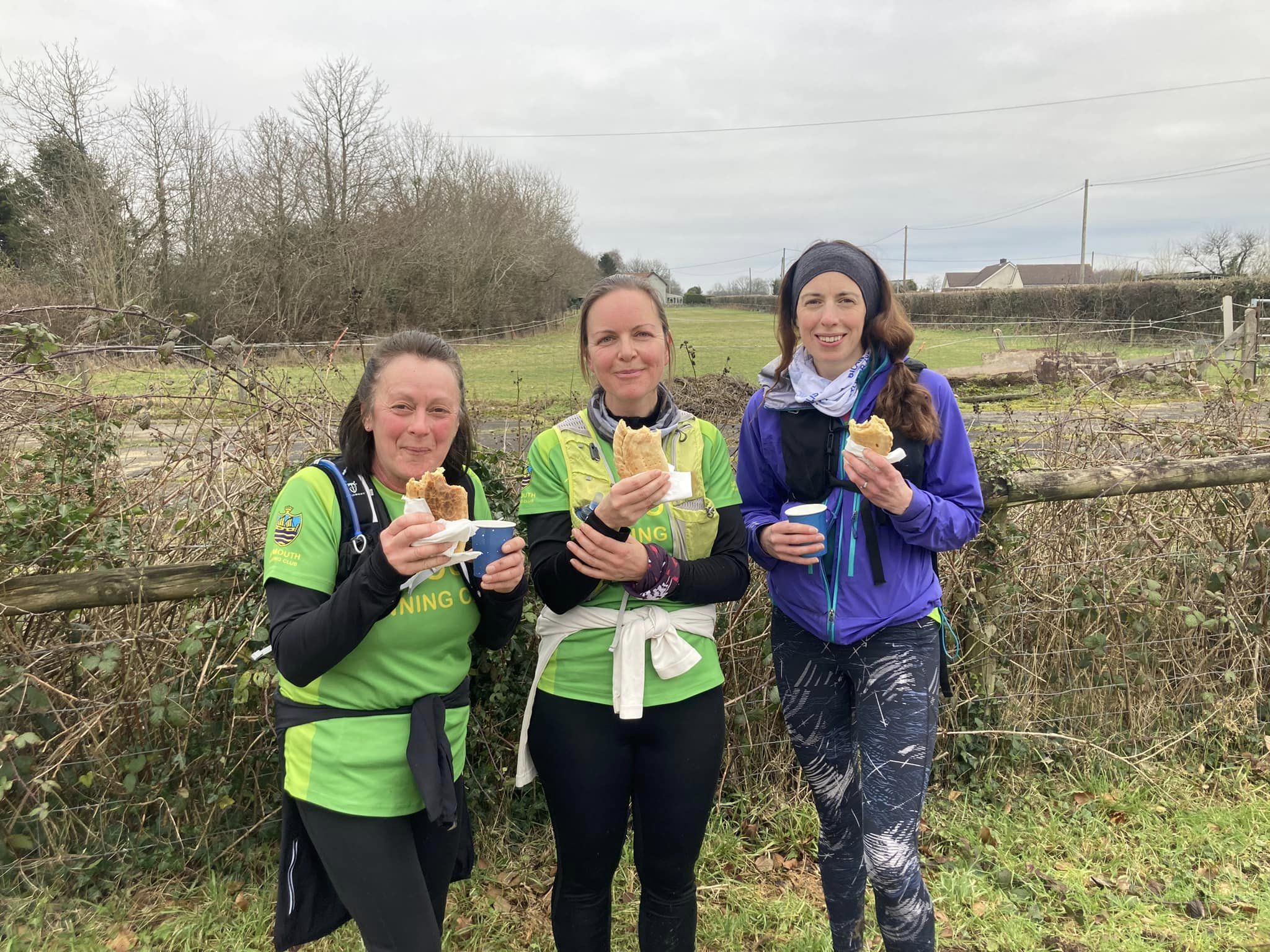 Kerry, Els and Rachel enjoying a bite of hot pasty! (Sidmouth Running Club)