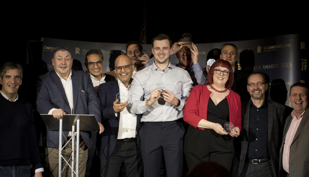 Letchworth specialist bank Redwood celebrates. The winners celebrate at the end of the evening with Redwood Bank co-founder and CEO Gary Wilkinson (second left) and host, comedian Angela Barnes