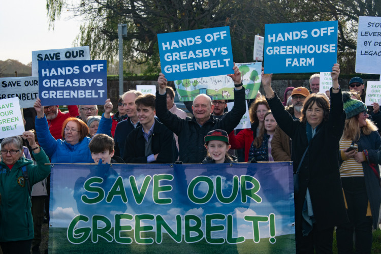 Pictured behind banner left to right: Cllr Tracy Elzeiny in blue, Cllr Max Booth, Conservative candidate David Fairbairn, Cllr Jenny Johnson. Credit: Edward Barnes