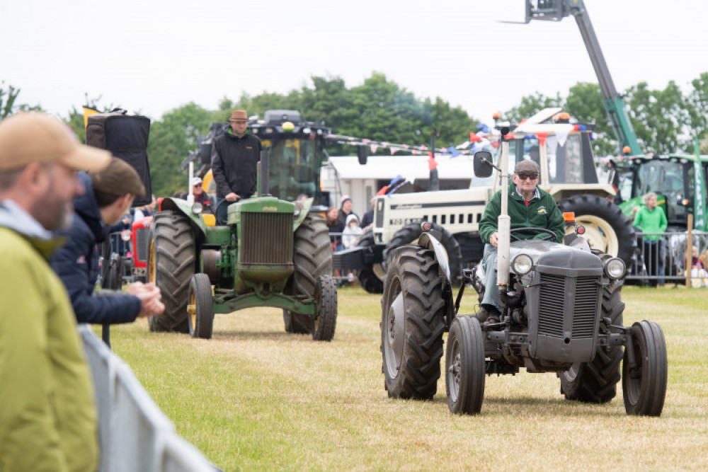 Vintage tractors on show in the main ring during last year's show (image supplied)