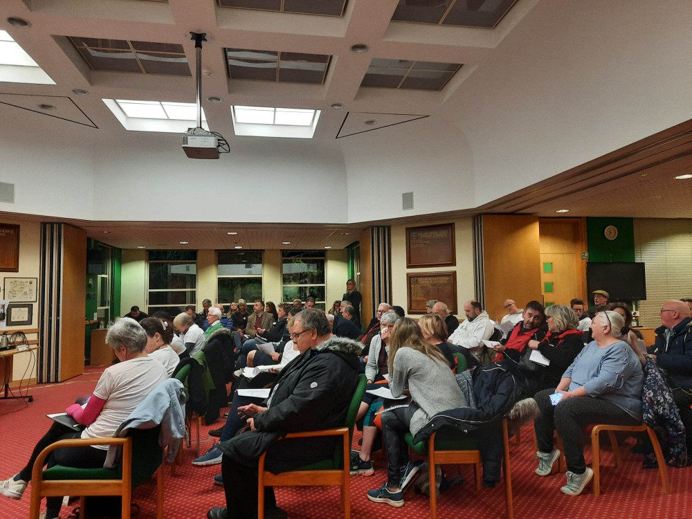 A full Council auditorium. Image credit: Nub News.