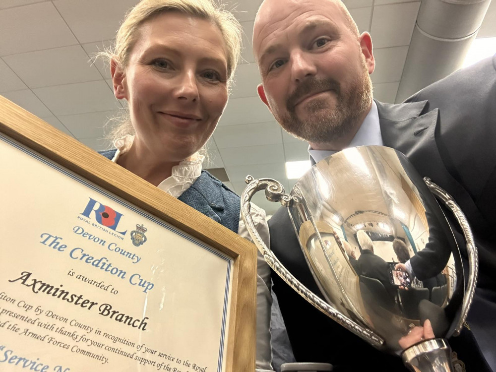 CPO Jo Ashkettle and her partner Lee Davis receive the Crediton Cup at the Devon County British Legion conference on behalf off the Axminster branch 