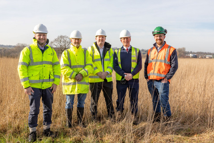 from (l-r) Ralph Kemp, Cheshire East Council’s head of environmental services, Councillor Mick Warren, chair of Cheshire East Council’s environment and communities committee, Dan Griffiths, Cheshire East Council’s programme manager for energy, carbon and economic development, Bob Wilkes, managing director for Biowise and Dave Scott, Leighton Grange Farm site manager for Biowise.
