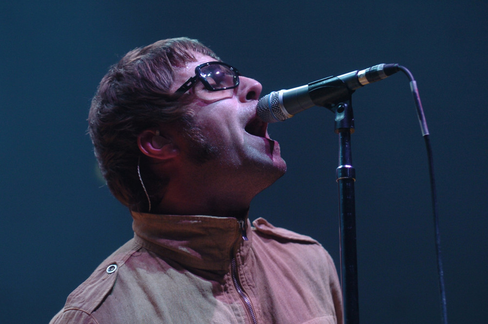 Almost as good as the real thing... it's not quite Liam Gallagher (pictured) but you can see tribute band Oasish in Coalville this weekend. Image: Dreamstime