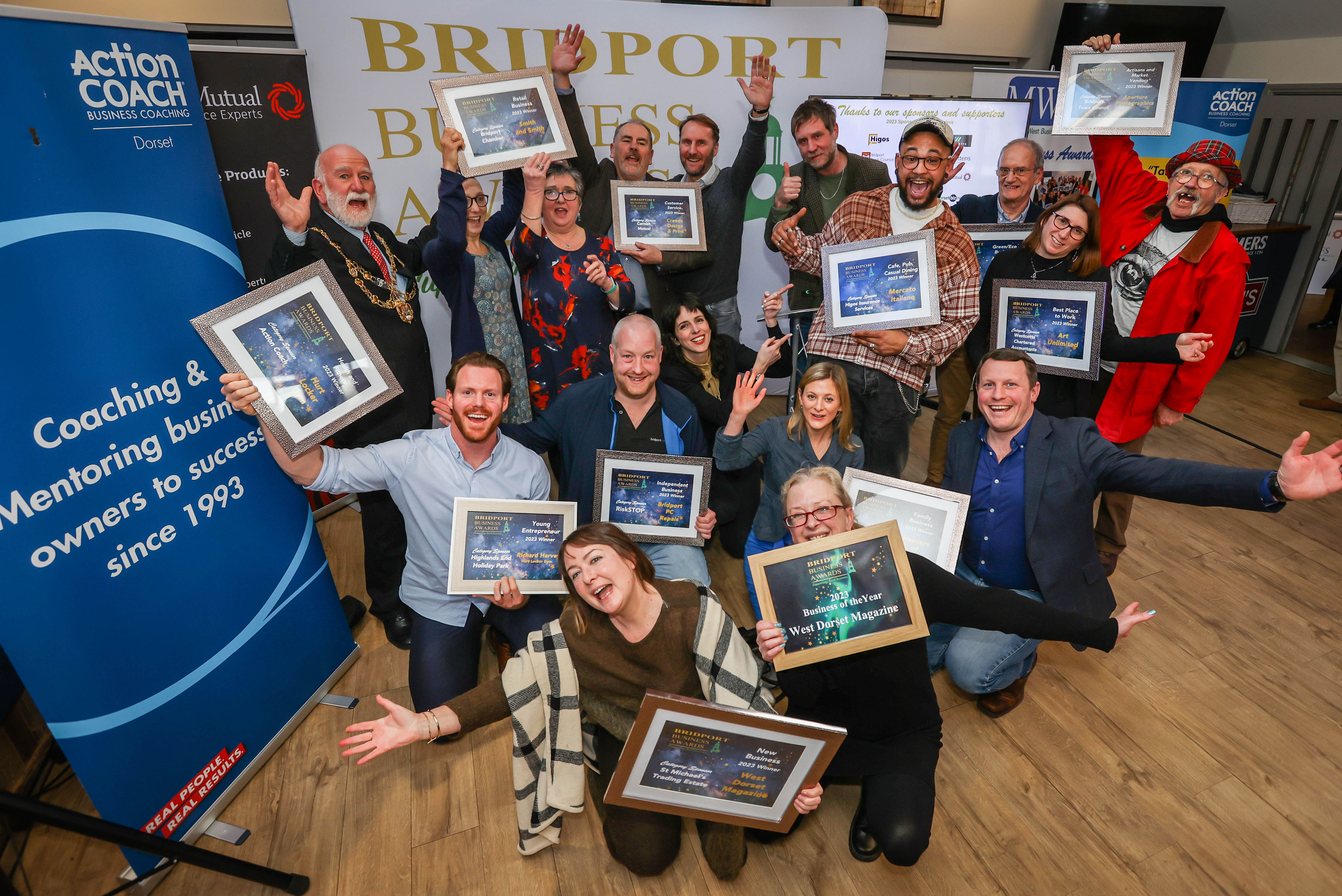 Bridport Business Awards winners, including Business of the Year West Dorset Magazine's Miranda Robertson and Karen Bate in the front (photo credit: Paul Collins)