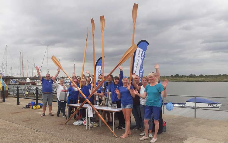 Members of the club celebrate the arrival of 'Victory'