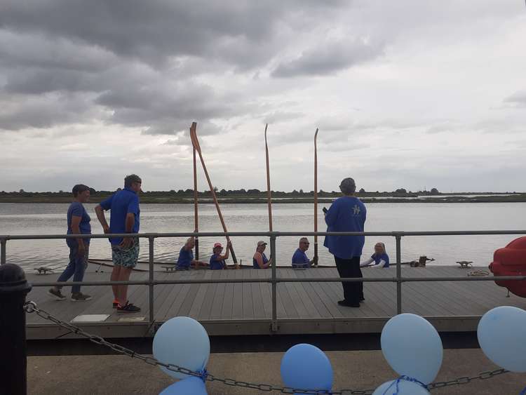 'Victory' is welcomed as the rowers who collected the gig from Maylandsea finish their two-hour row