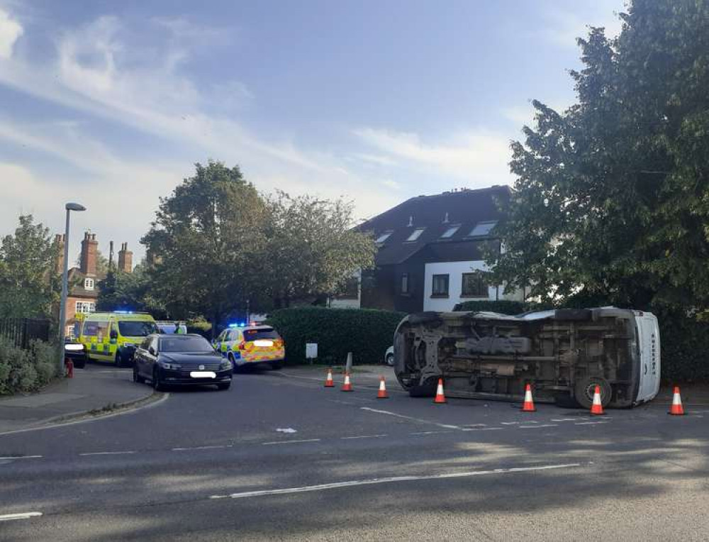 The overturned vehicle at the scene of the accident