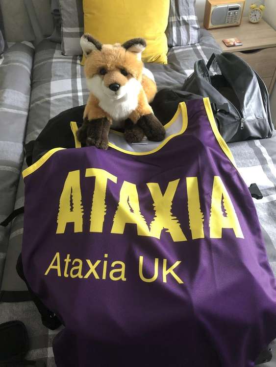 The men have been supplied with Ataxia UK shirts by the charity