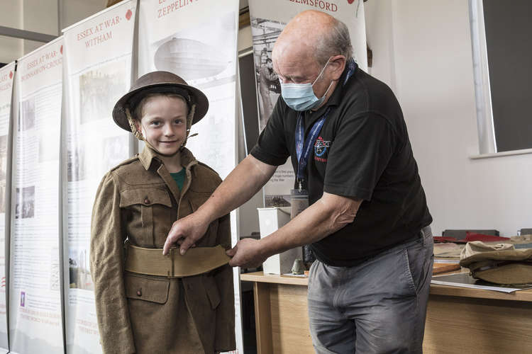 Mick from the museum checks Charley Allen's equipment (Credit: Stow Maries)