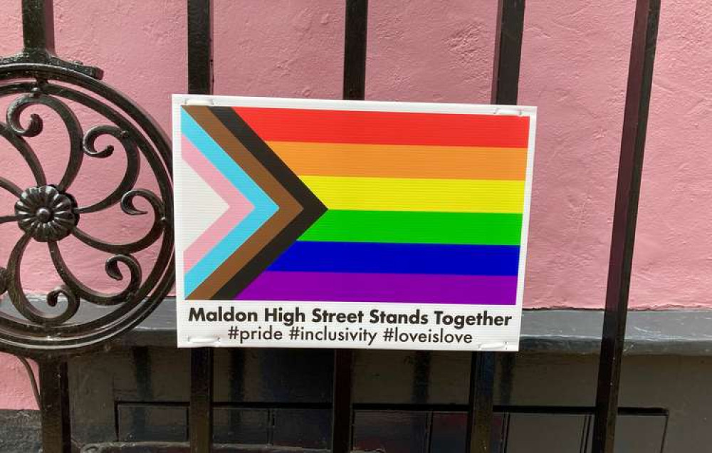 Businesses displayed posters and Pride flags across the High Street in response to the comments