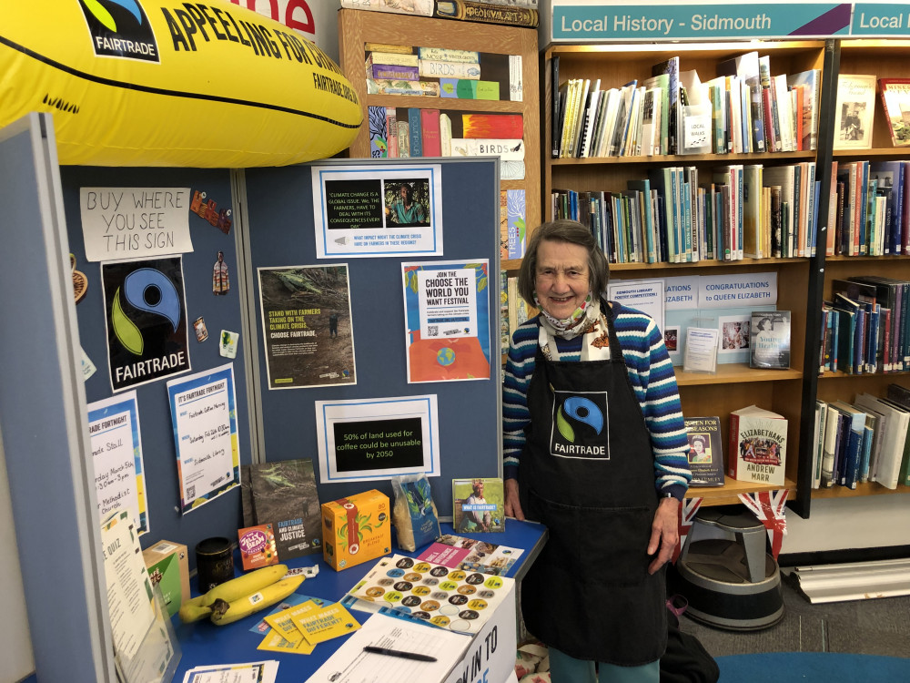 Member Jill O’Hara and library display (Fairtrade Sidmouth Group)