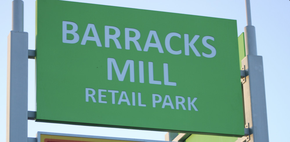 The advertising board at the entrance of the Barracks Mill Retail Park, Macclesfield. (Image - Alexander Greensmith / Macclesfield Nub News)