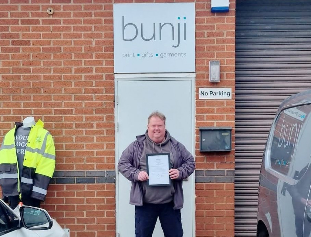 Steve Boyle, who runs Bunji Printing, pictured with his FSC certificate (image via ChalmersNewsPR)