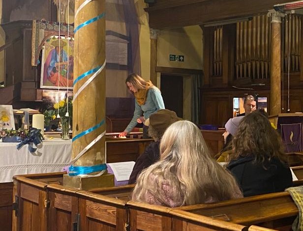 Candles are lit at the service (photo courtesy of Margie Barbour)