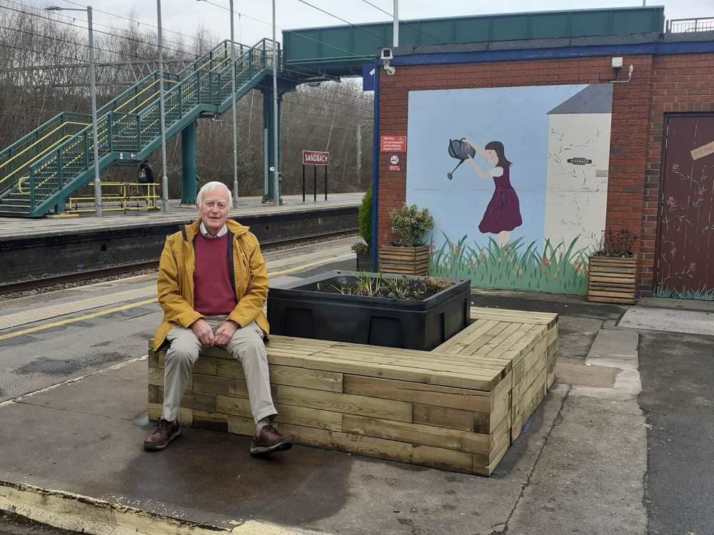 FOSS chairman, John Scarrott is delighted with the new seating at Sandbach station (Photo: Deborah Bowyer/Sandbach Nub News) 