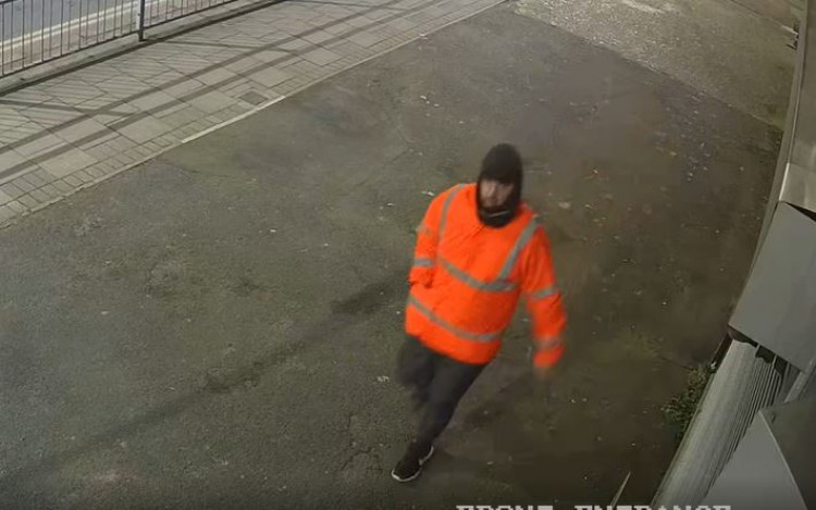 Police are seeking help to trace this man in connection with a robbery in Mortlake in the early hours of Friday morning. Credit: Met Police.