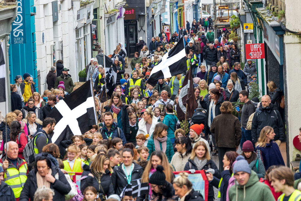 The parade heads through Falmouth (Image: Jory Mundy) 