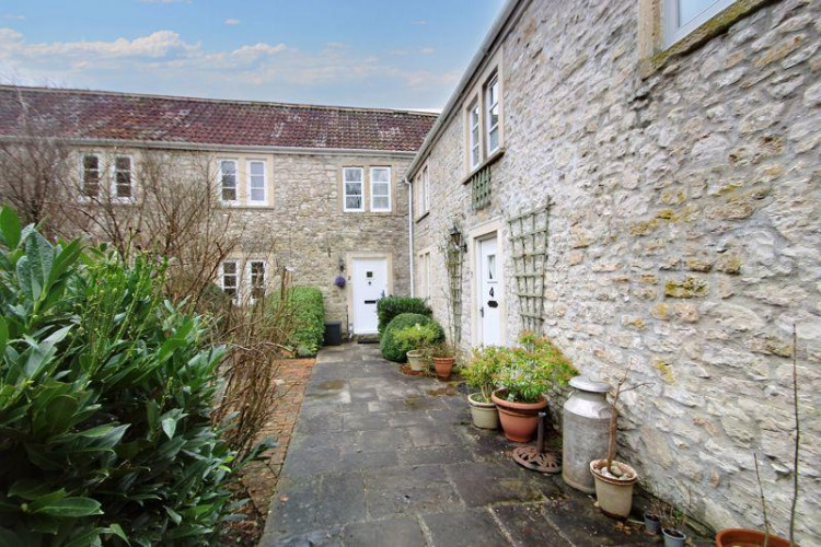 Lovely features retained throughout with quality joinery and plantation shutters to most windows