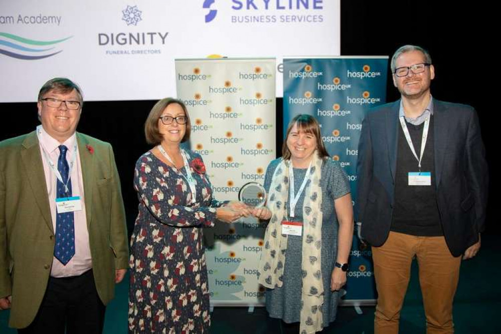 (L-R) Paul Jennings, Alison Stevens, Nikki Tuff and Matt Sweeting with their Innovation in Partnership Working Award (Photo: Farleigh Hospice)