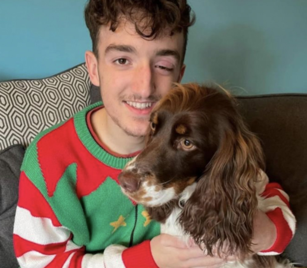 Tom Brett with adorable pet pooch Frankie. CREDIT: Tom Brett and North Hertfordshire Hospitals’ Charity 