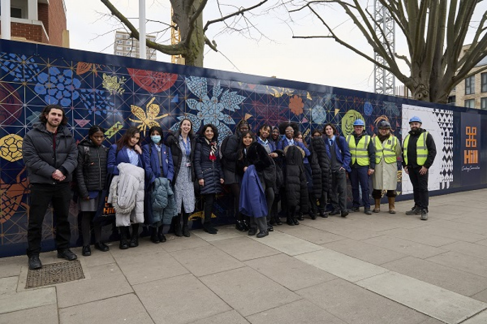 Councillor Aydin Dikerdem with pupils from St John Bosco College and council officers from the development team (Credit: Wandsworth Council)