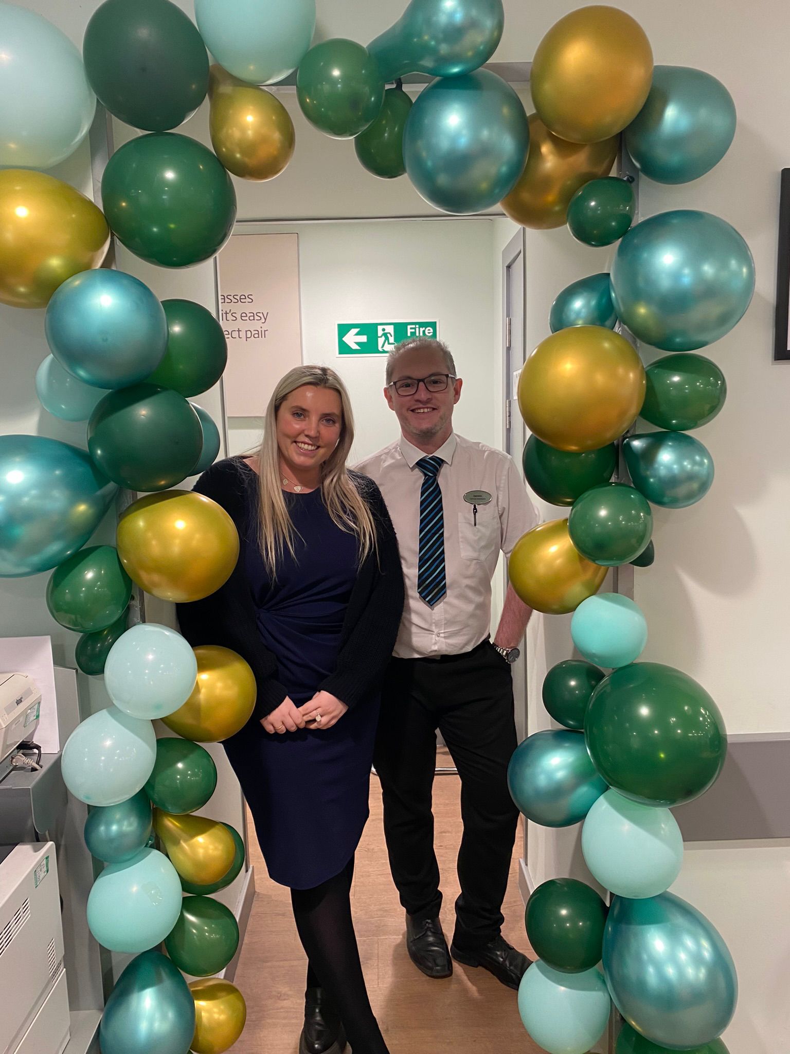 Ellie Davies, pre reg, and Geraint Watkins, optical assistant enjoying the celebrations