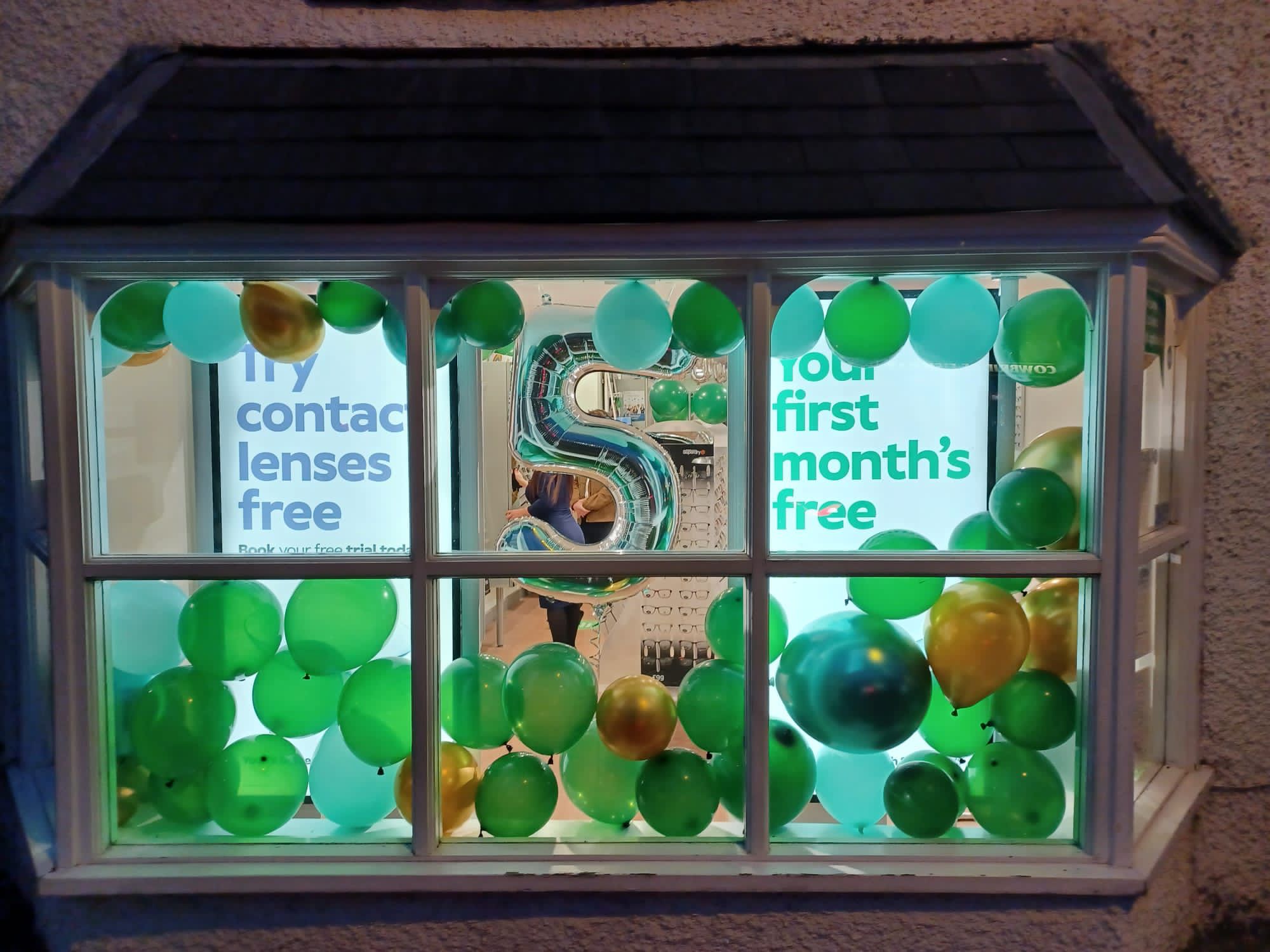 Specsavers Cowbridge shop window on its fifth birthday