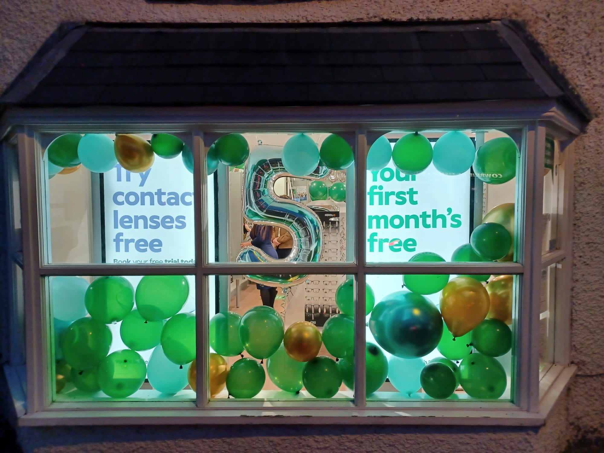 Specsavers Cowbridge shop window on its fifth birthday Specsavers Cowbridge shop window on its fifth birthday