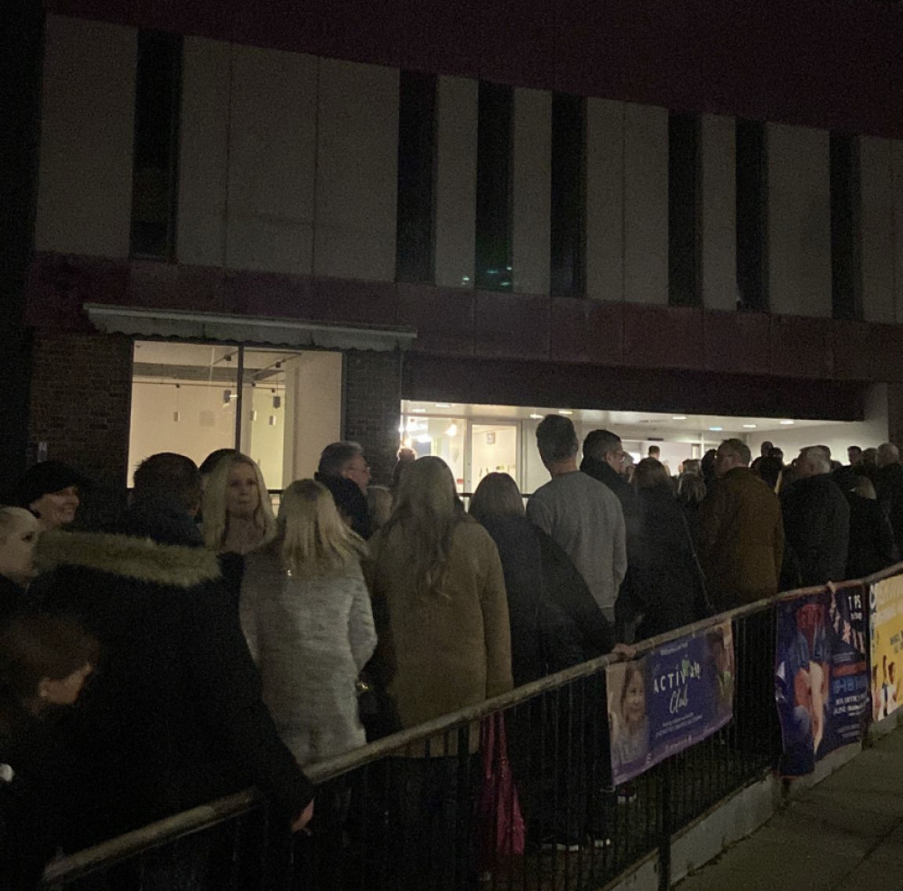 Attendees at tonight's event at the Thameside outside the building while the alarm was investigated. 