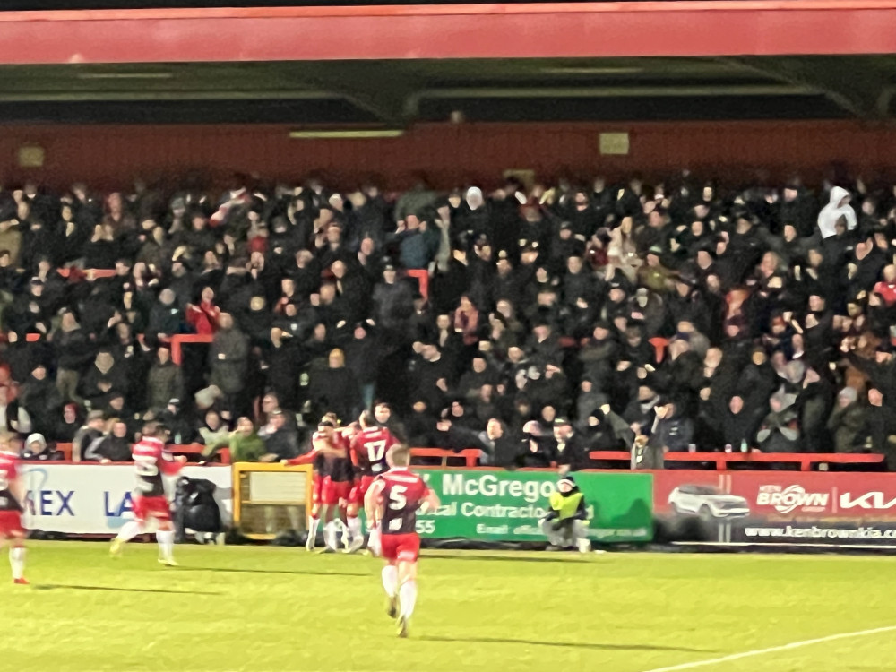 Three Things We Learned after Boro beat The Alex by Owen Rodbard. PICTURE: Jamie Reid and teammates celebrate his crucial goal with fans on the East Terrace. CREDIT: @laythy29