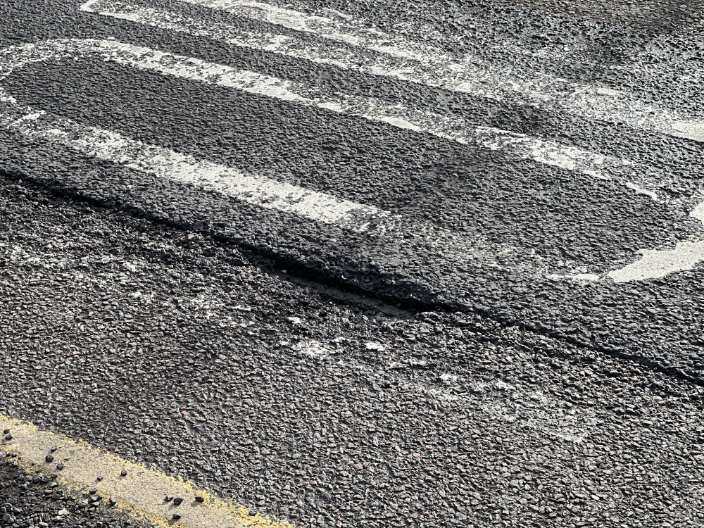 Where is the worst pothole in Hitchin? PICTURE: A deep hole in Bedford Road. CREDIT: @HitchinNubNews