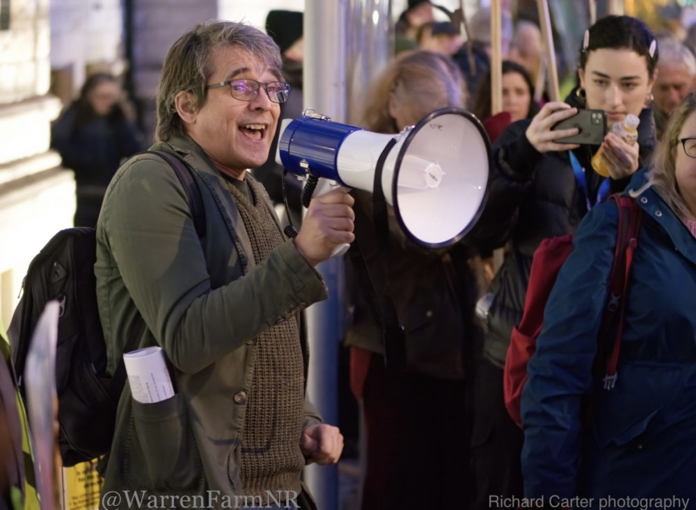 Dr Mark Spencer addresses the crowd at the Warren Farm protest. Photo: Warren Farm Nature Reserve.