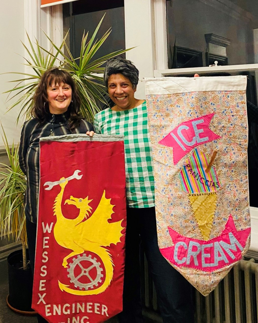 Mel & Aliss with flags they created for the Working Memories project