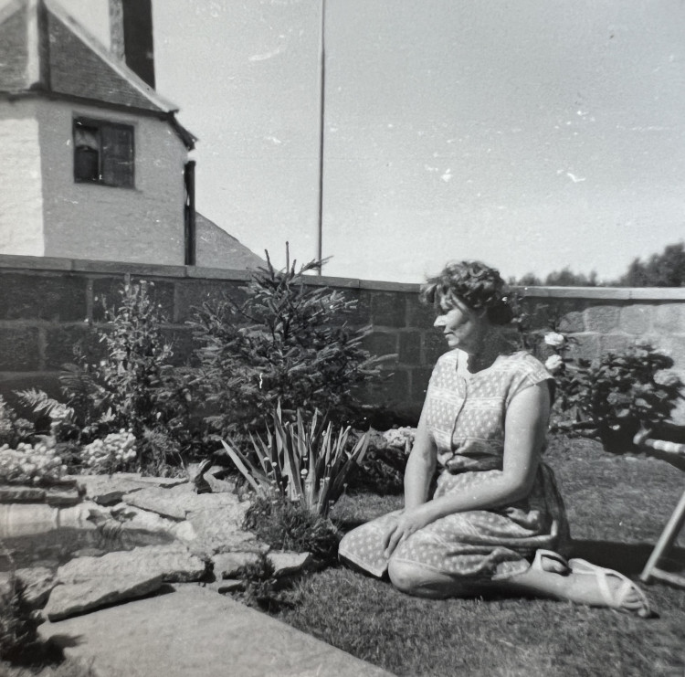 Nancy Gifford in the garden of her home at The Mead in Street 