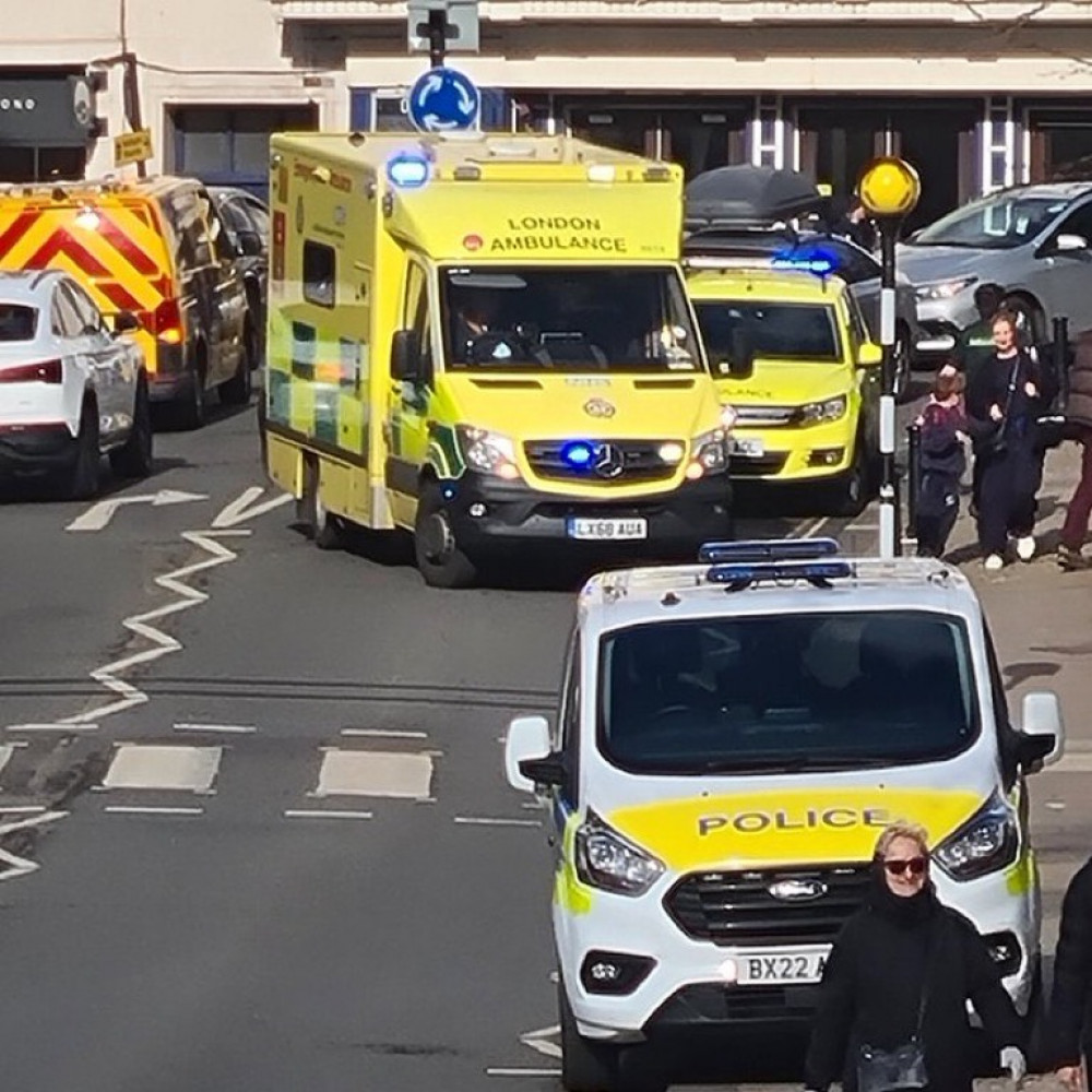 An ambulance was on the scene and the woman was being attended to outside the Bills restaurant.