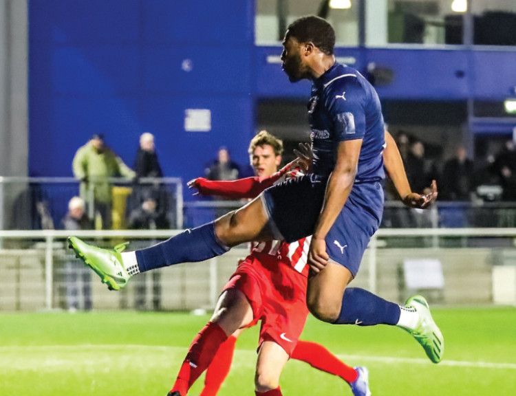 High-flying action from Wednesday's match. Picture by Kevin Lamb (Lambpix). 