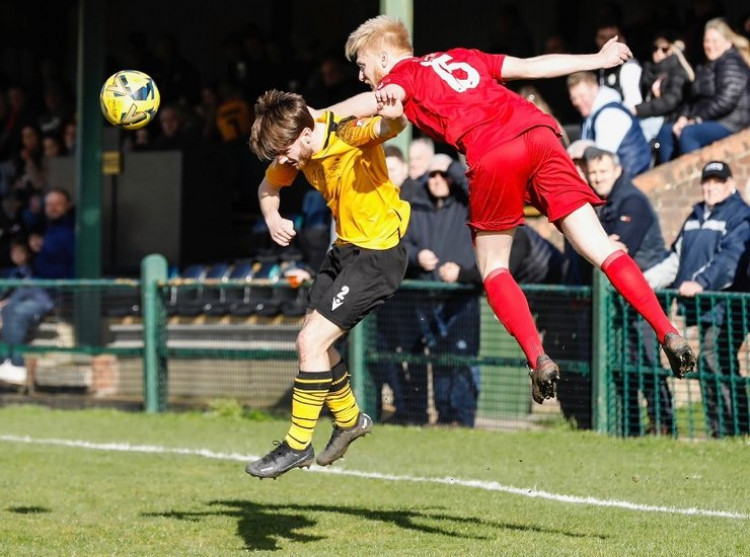 Ben Wyss challenging for the ball. Picture by Alan Edmonds