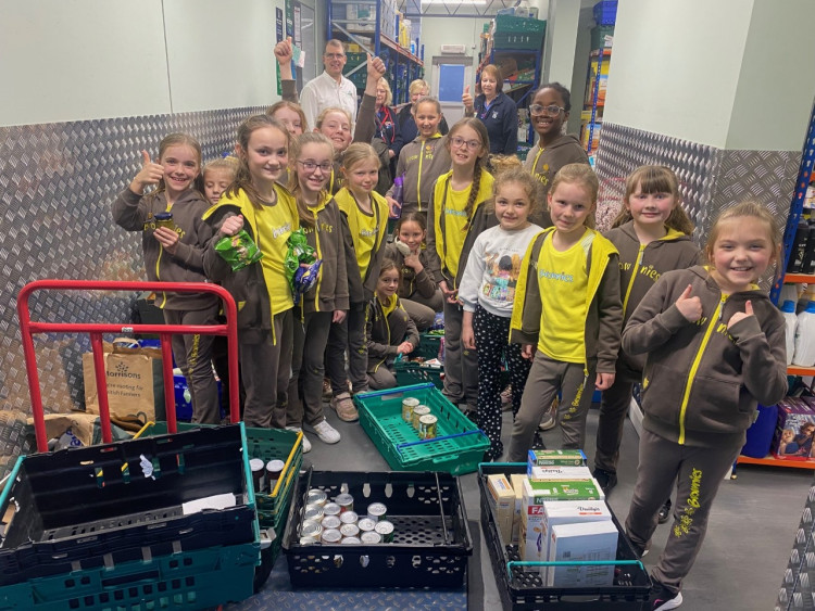 The Brownies at Thurrock Foodbank. 