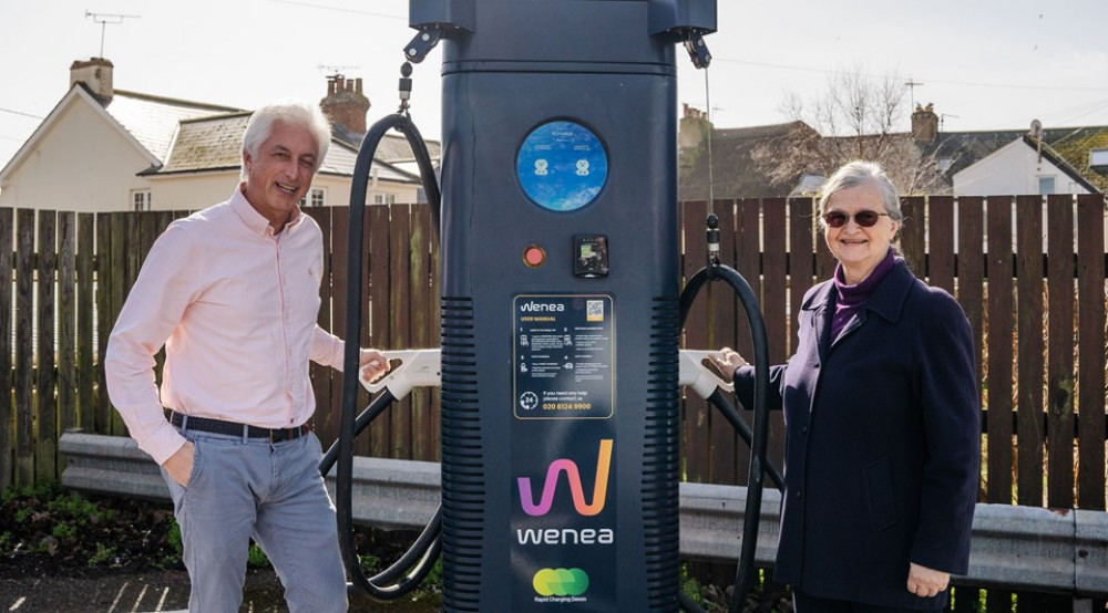 Jose Contreras from Wenea and Councillor Marianne Rixson, EDDC's portfolio holder for Climate Action and Emergencies stood next to a new EV charger (Credit: East Devon District Council)